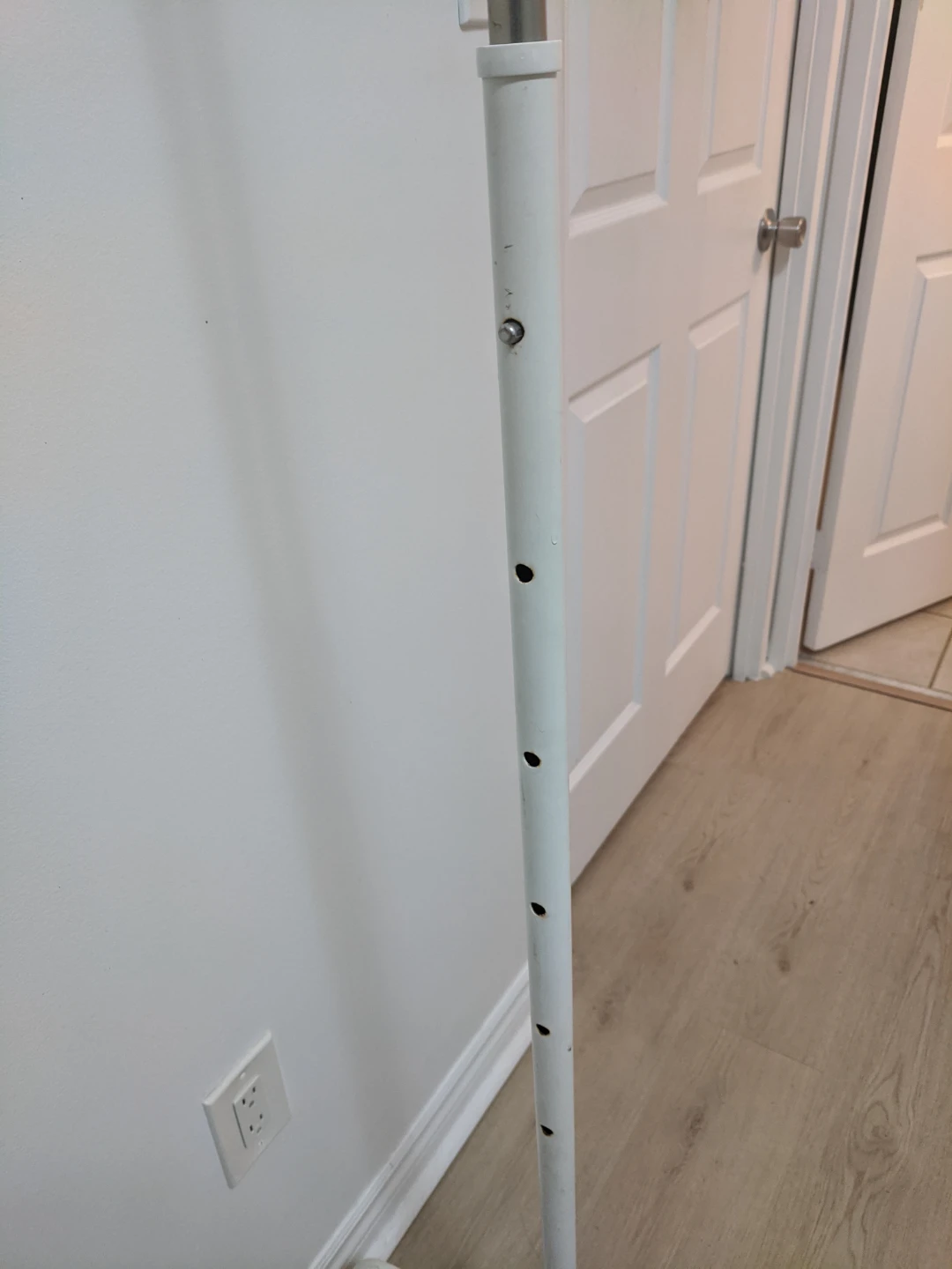 White metal clothing rack with wheels - photo 4