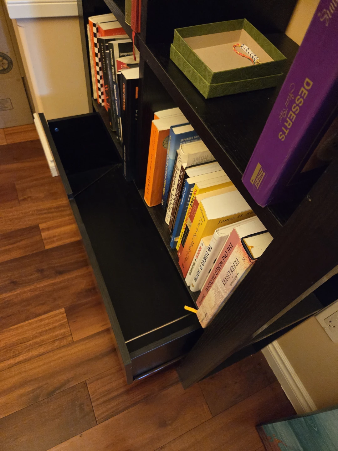 Black wooden bookshelf with storage drawer - photo 2
