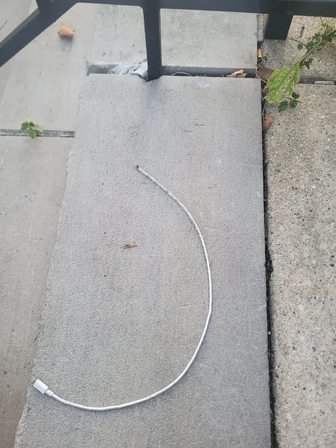 Broken White Lightning Charging Cable