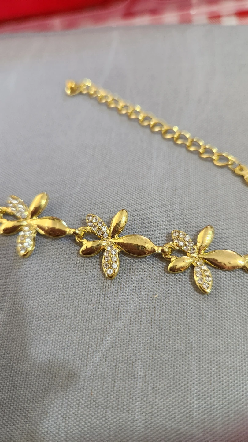 Gold-tone flower charm bracelet with rhinestones - photo 2