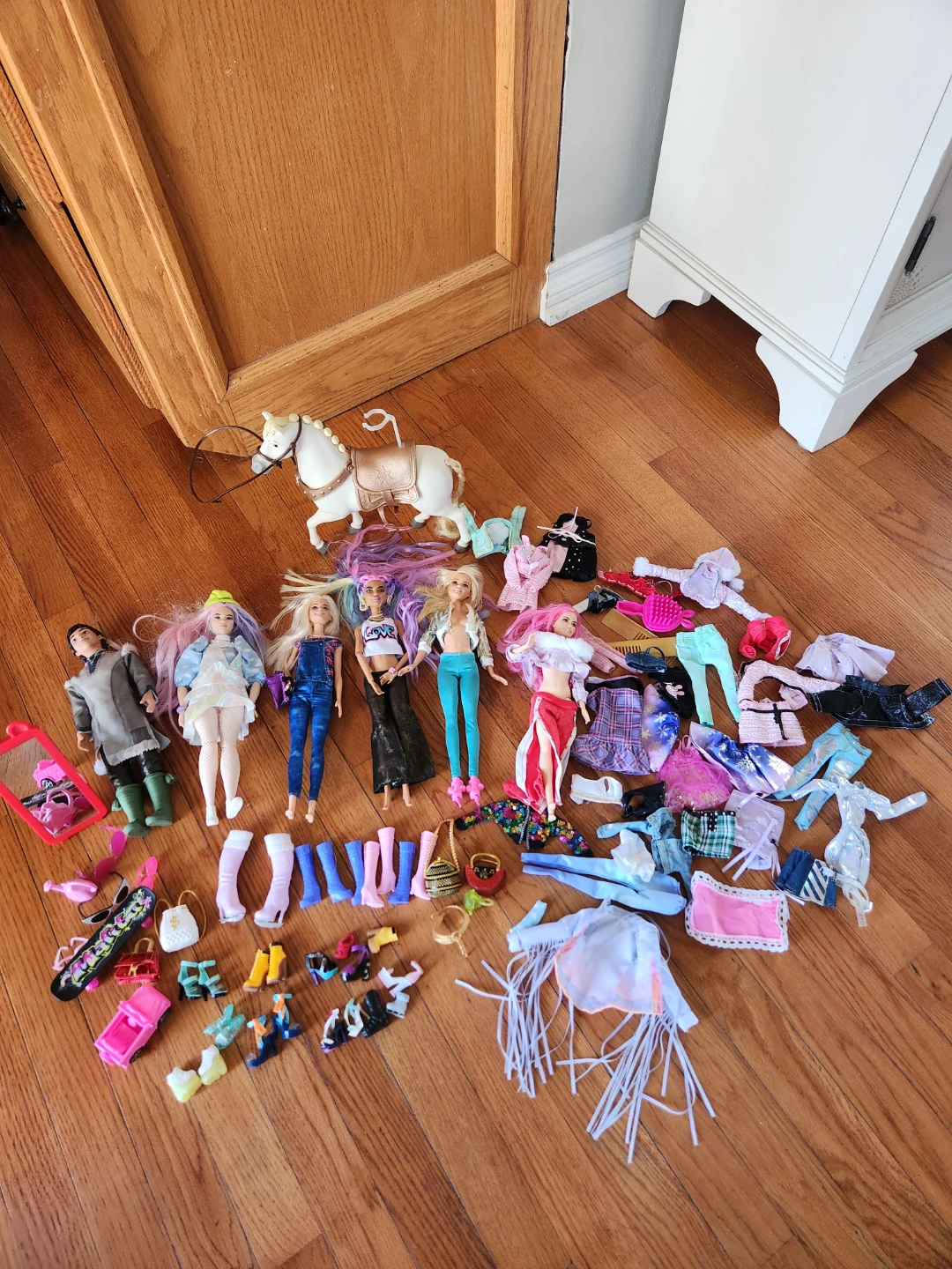 Barbie doll lot with horse and assorted clothing