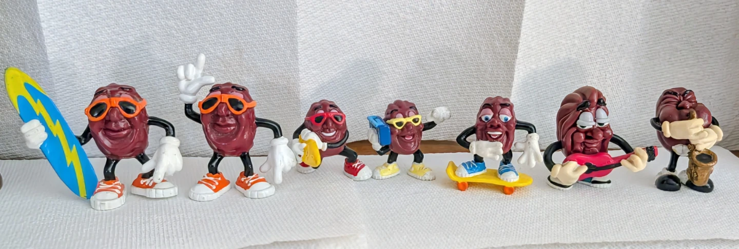 Set of 7 California Raisins Collectible Figures