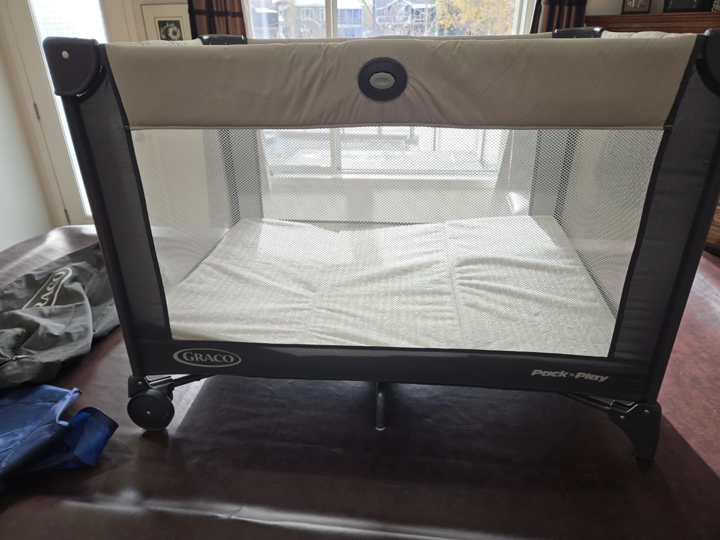 Graco Pack n Play Portable Playard with extra mattress.