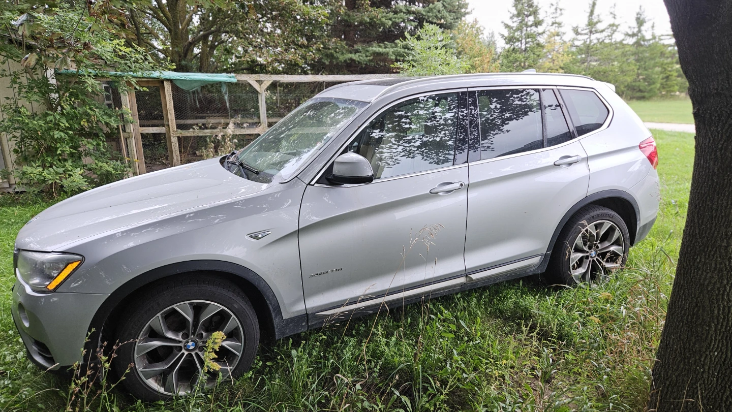 Silver BMW X3 SUV - photo 3