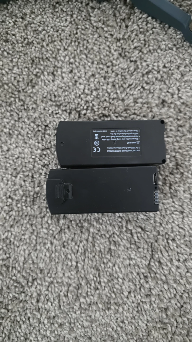 Drone with controller, batteries, and carrying case - photo 3
