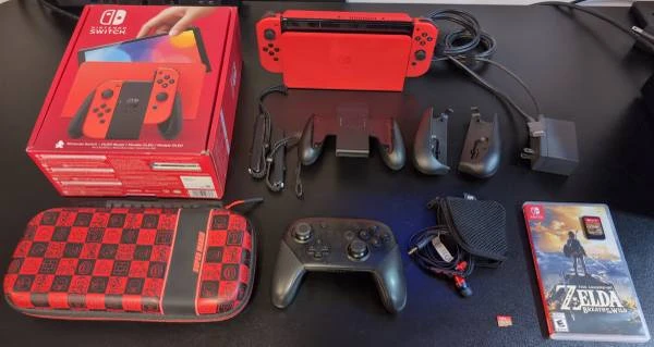 Nintendo Switch OLED - Mario Red Edition bundle - $400