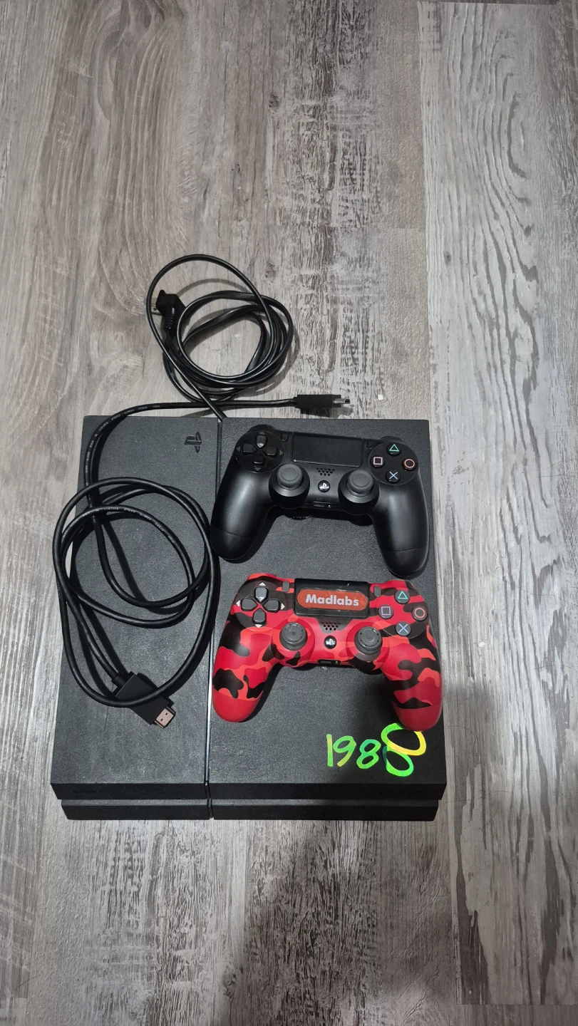 Sony PlayStation 4 Console with 2 Controllers