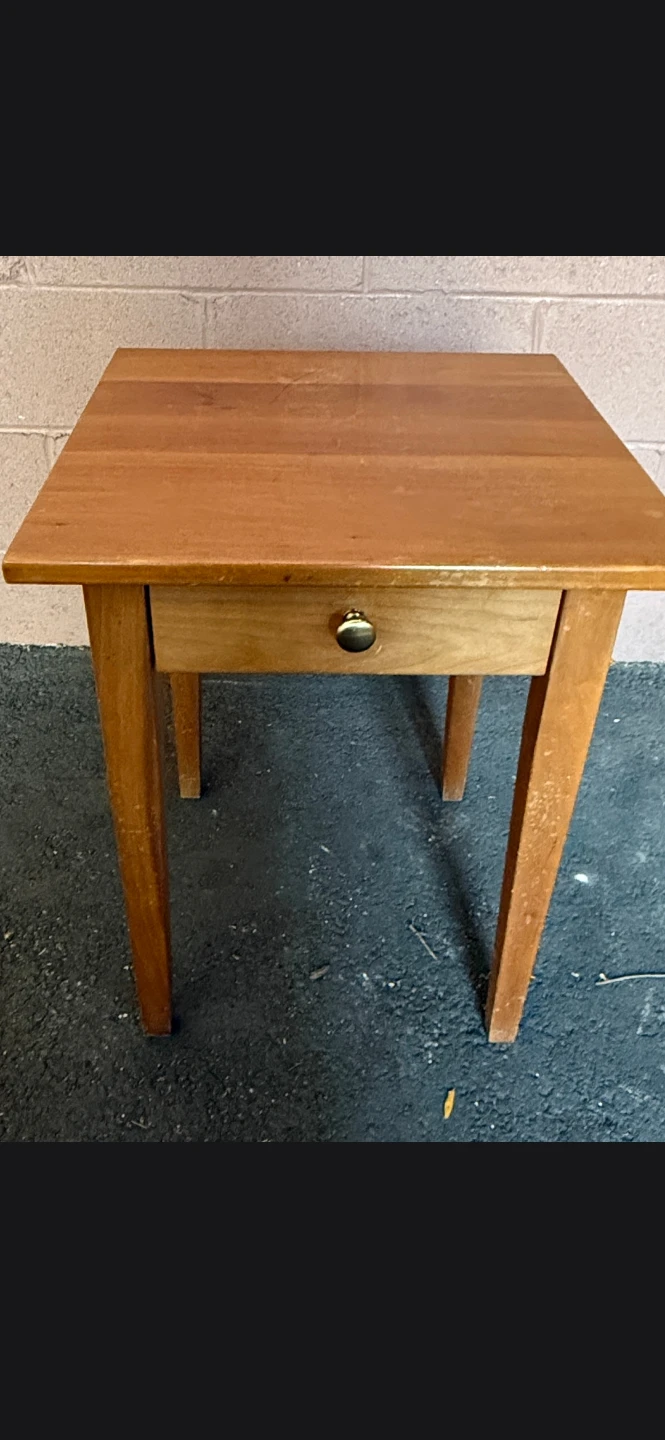 Wooden side table with drawer