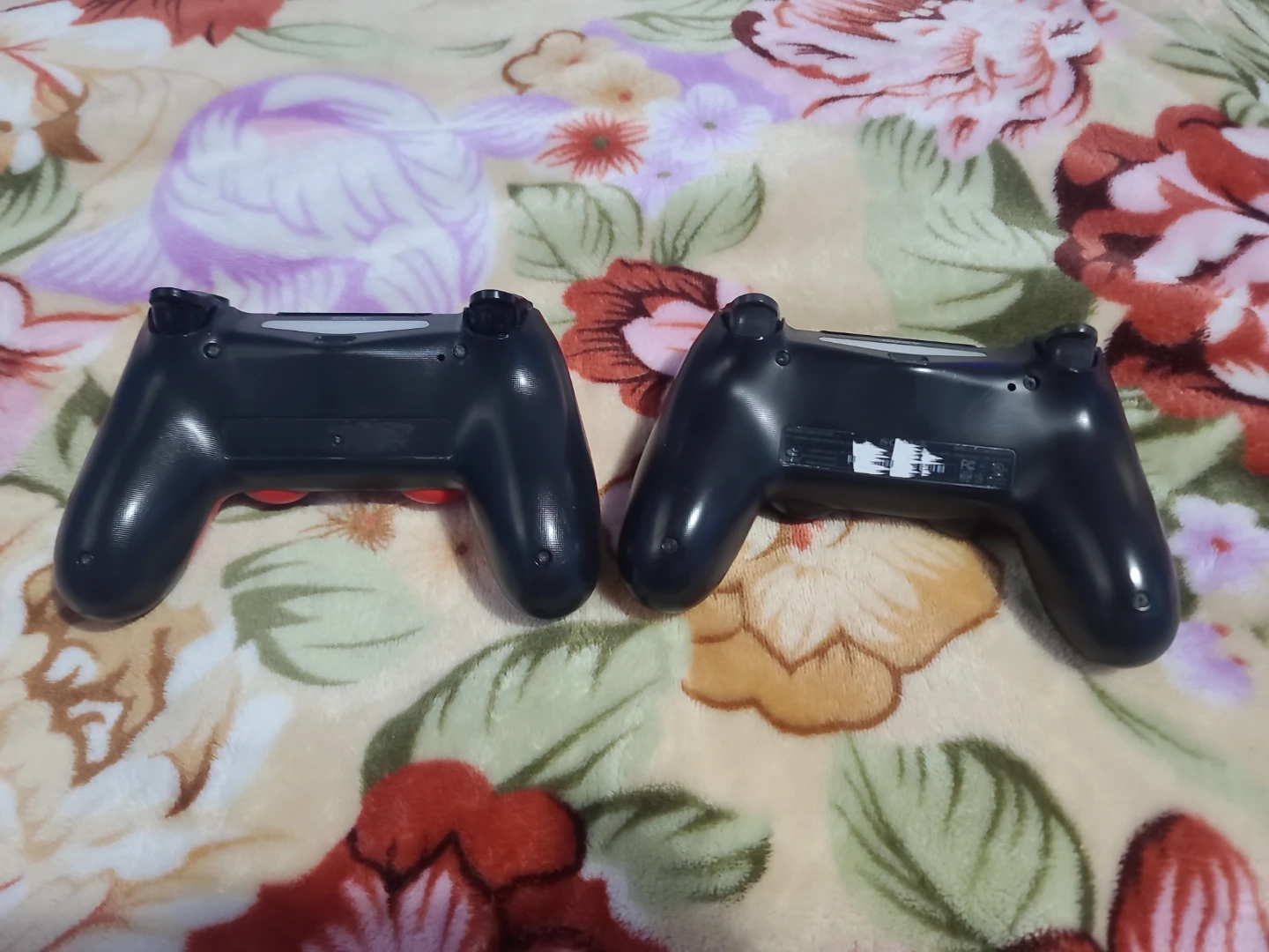 Two Sony PlayStation 4 DualShock Wireless Controllers