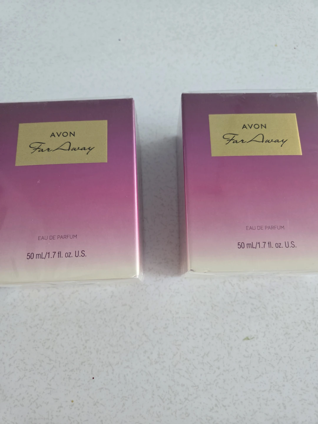 2 Avon Far Away Eau de Parfum bottles
