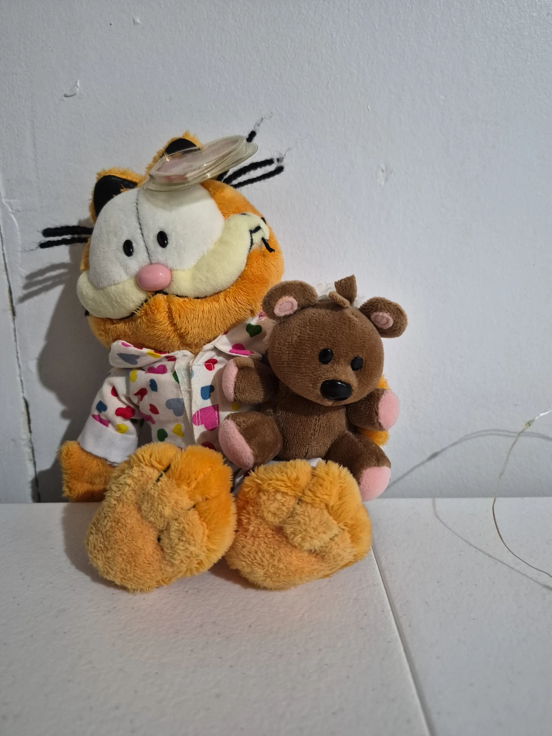 Garfield plush toy with teddy bear