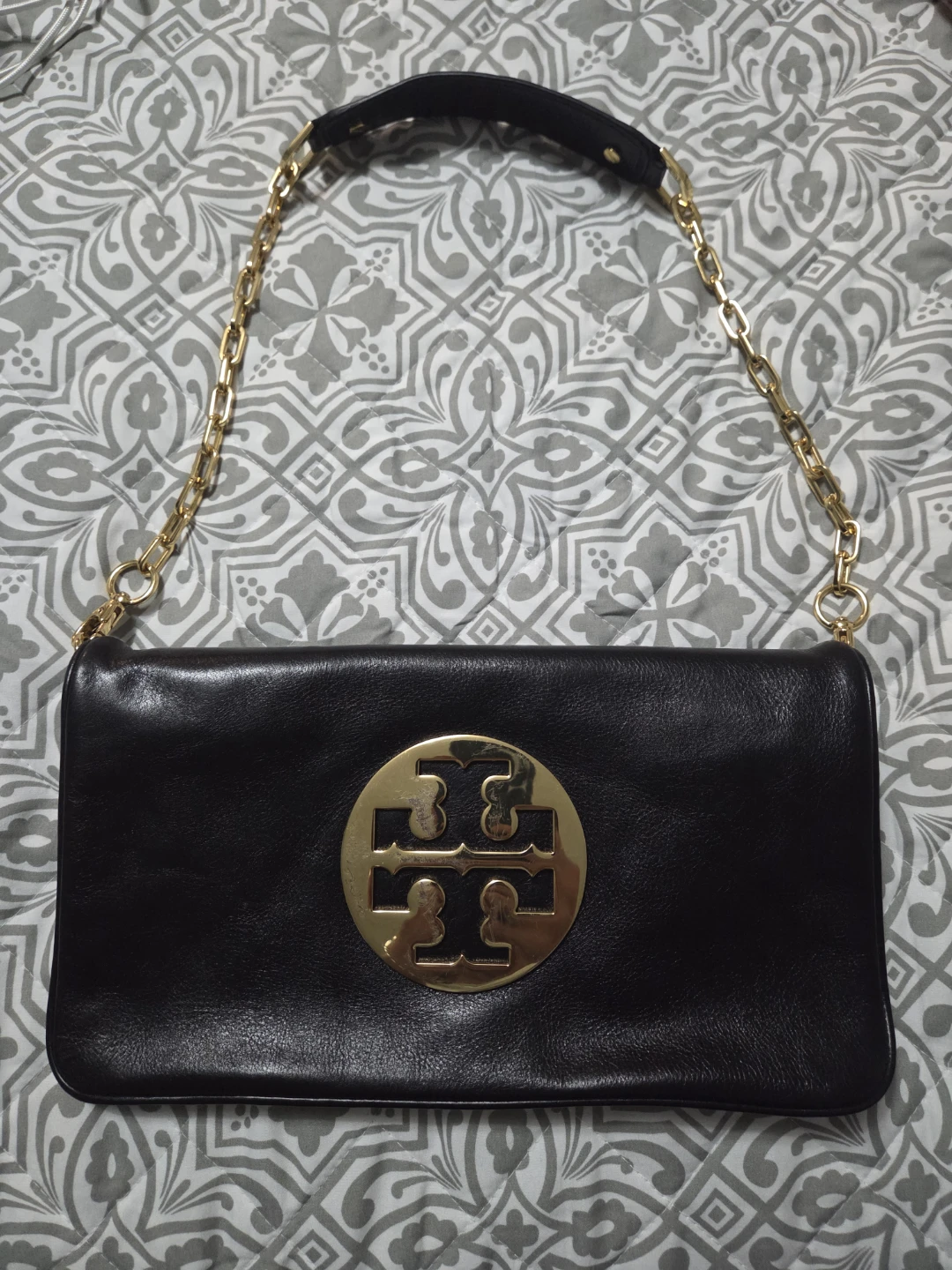Tory Burch black leather clutch bag