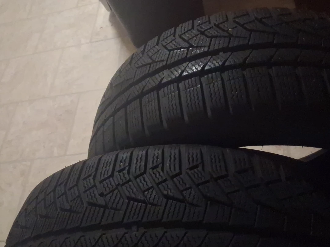 2 215 50 17  arctic vision winter tires  85 percent tread