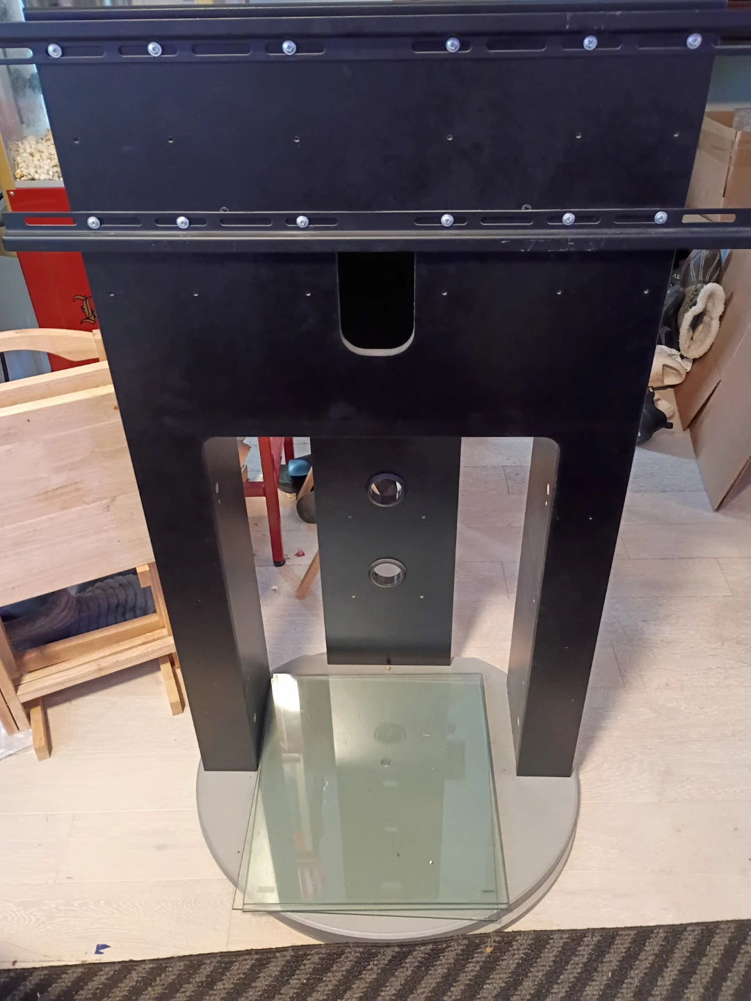 Tv stand , swivels and 3 glass shelves