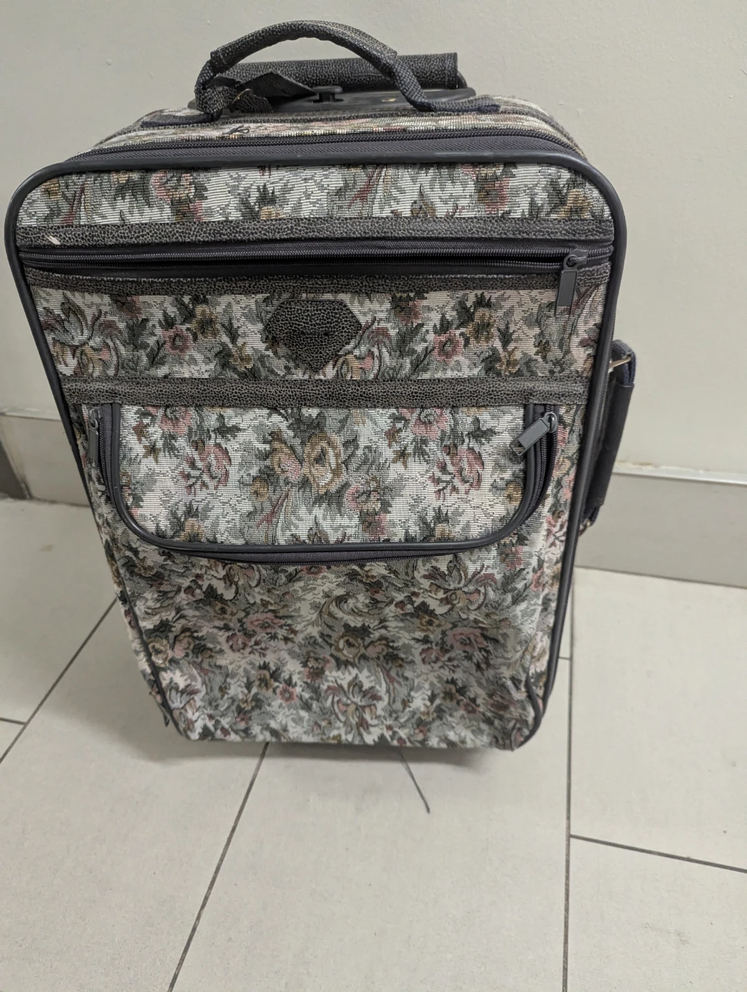 Vintage Jordache rolling suitcase