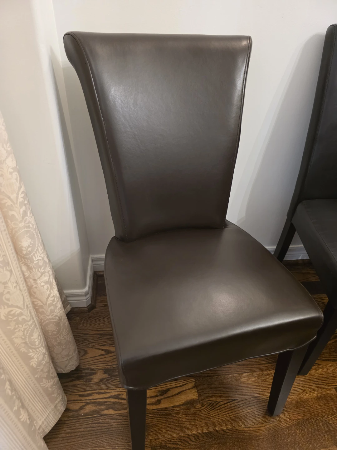 Two Dark Brown Dining Chairs