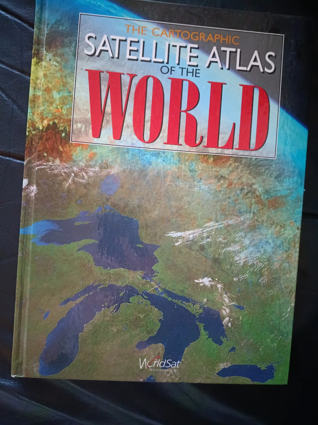 The Cartographic Satellite Atlas of the World