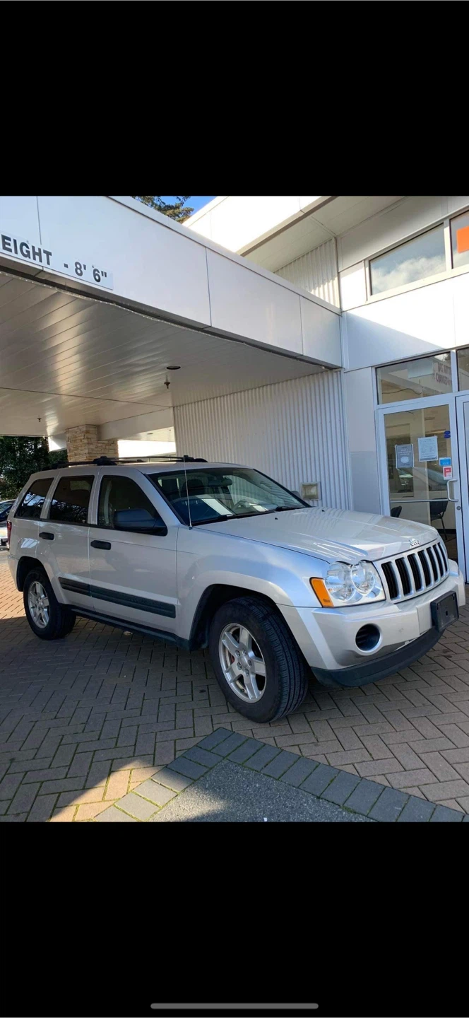 Silver Jeep SUV - photo 2