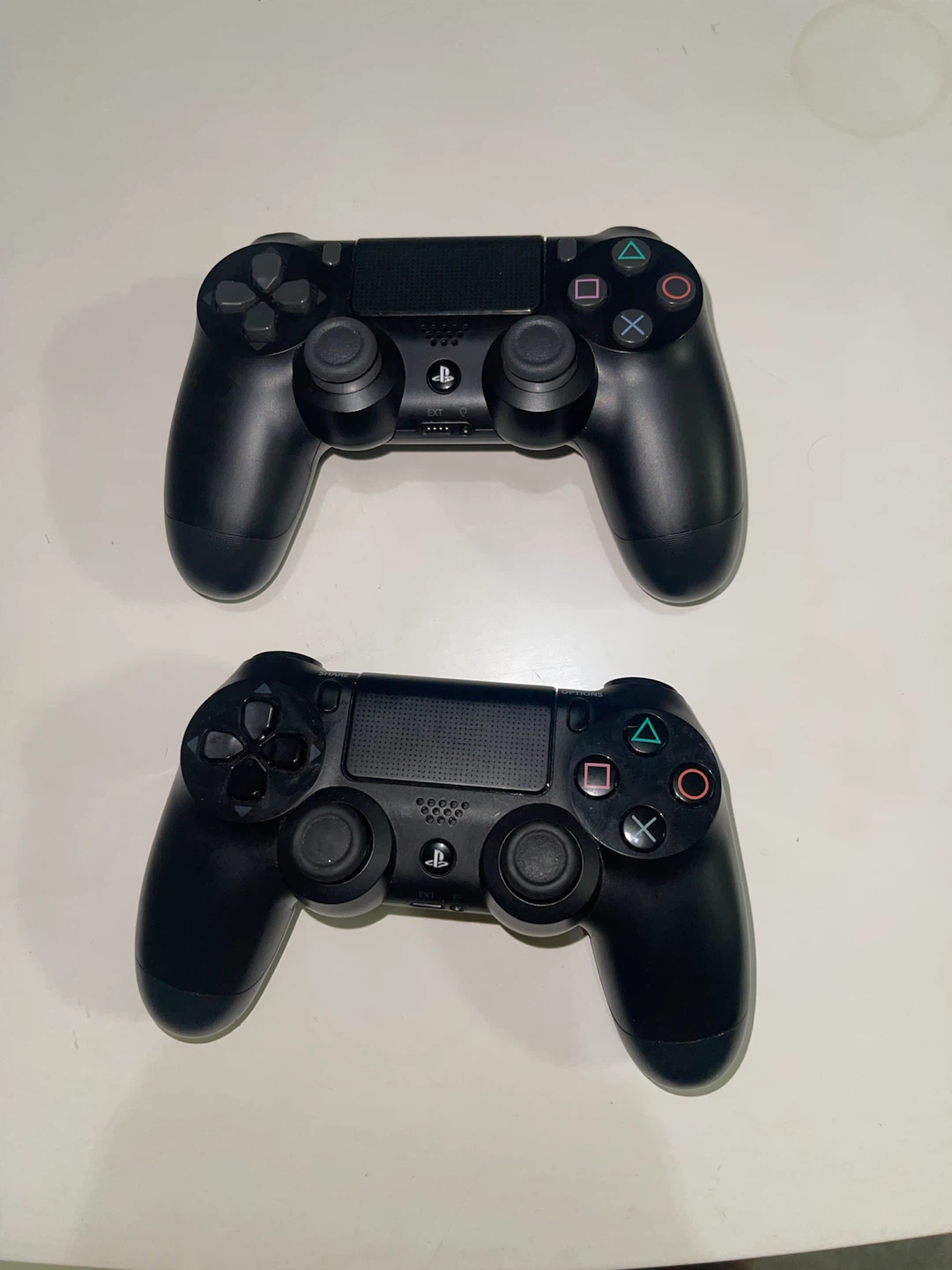 Two Sony PlayStation 4 DualShock 4 Wireless Controllers