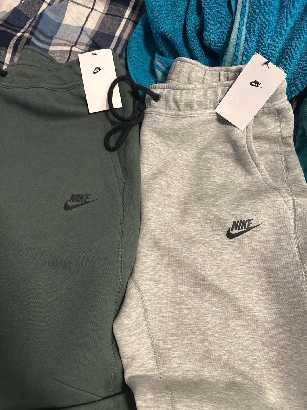 Two pairs of Nike Tech Fleece joggers, size Medium - photo 2