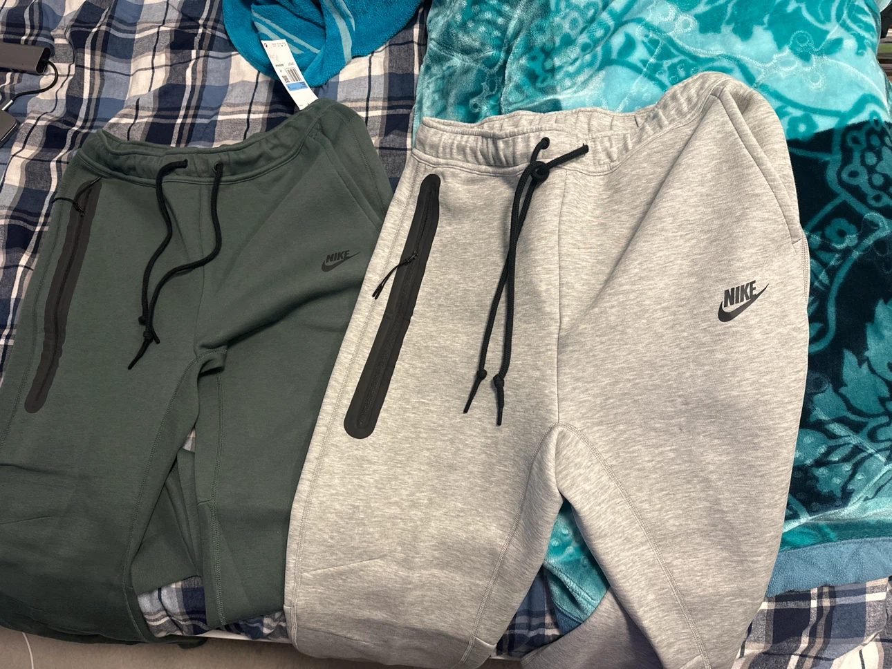 Two pairs of Nike Tech Fleece joggers, size Medium - photo 3