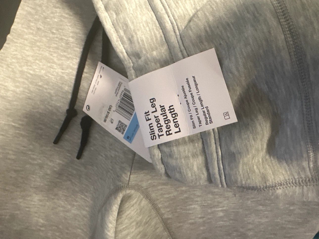 Two pairs of Nike Tech Fleece joggers, size Medium - photo 4