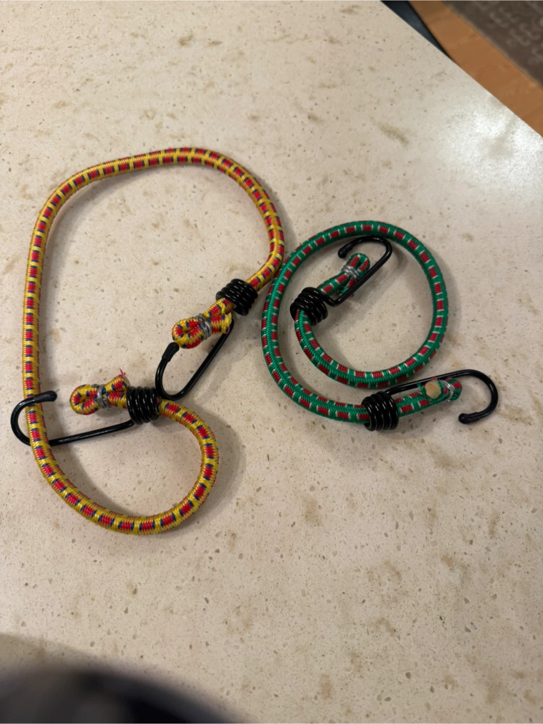 Two bungee cords