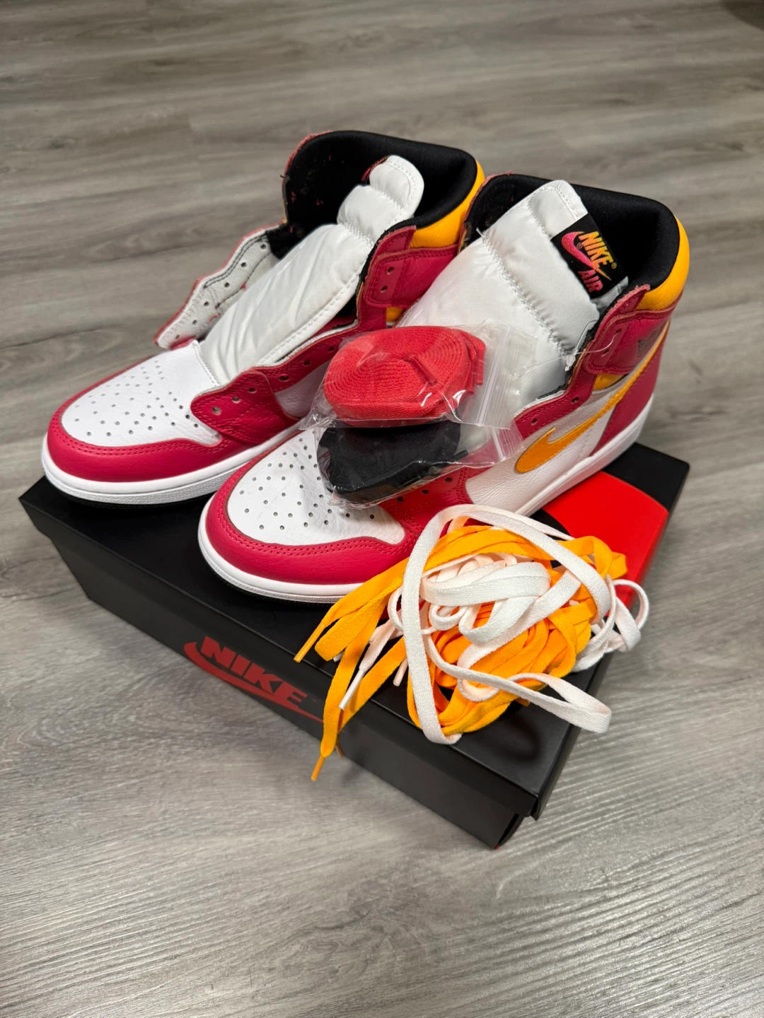 Air Jordan 1 Retro High OG “Light Fusion Red”