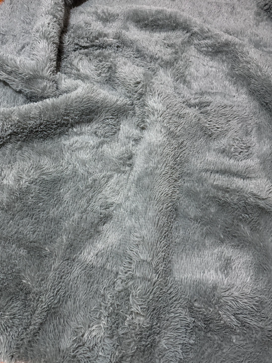 Soft grey faux fur area rug