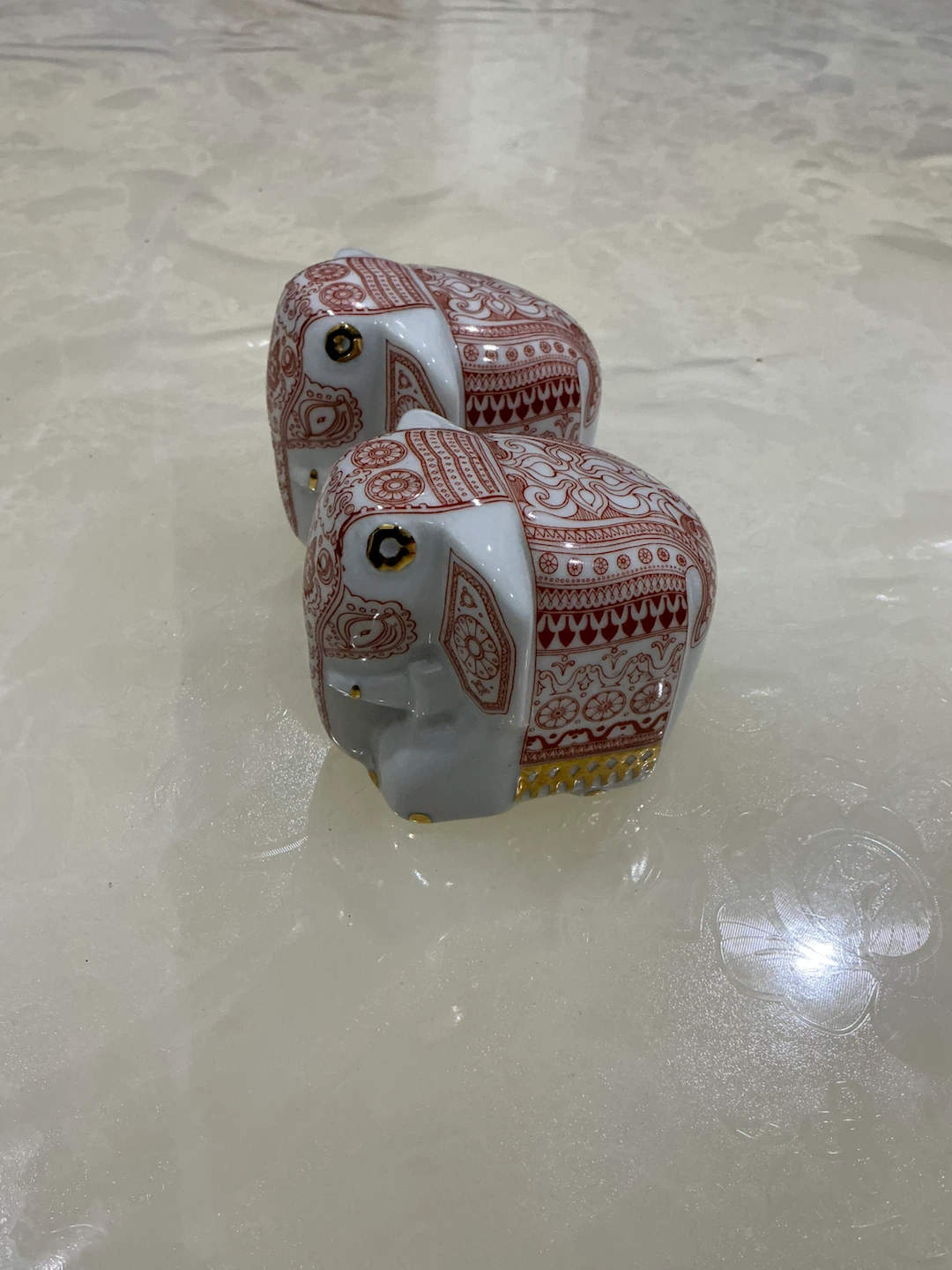 Two decorative Sri Lankan porcelain elephant figurines