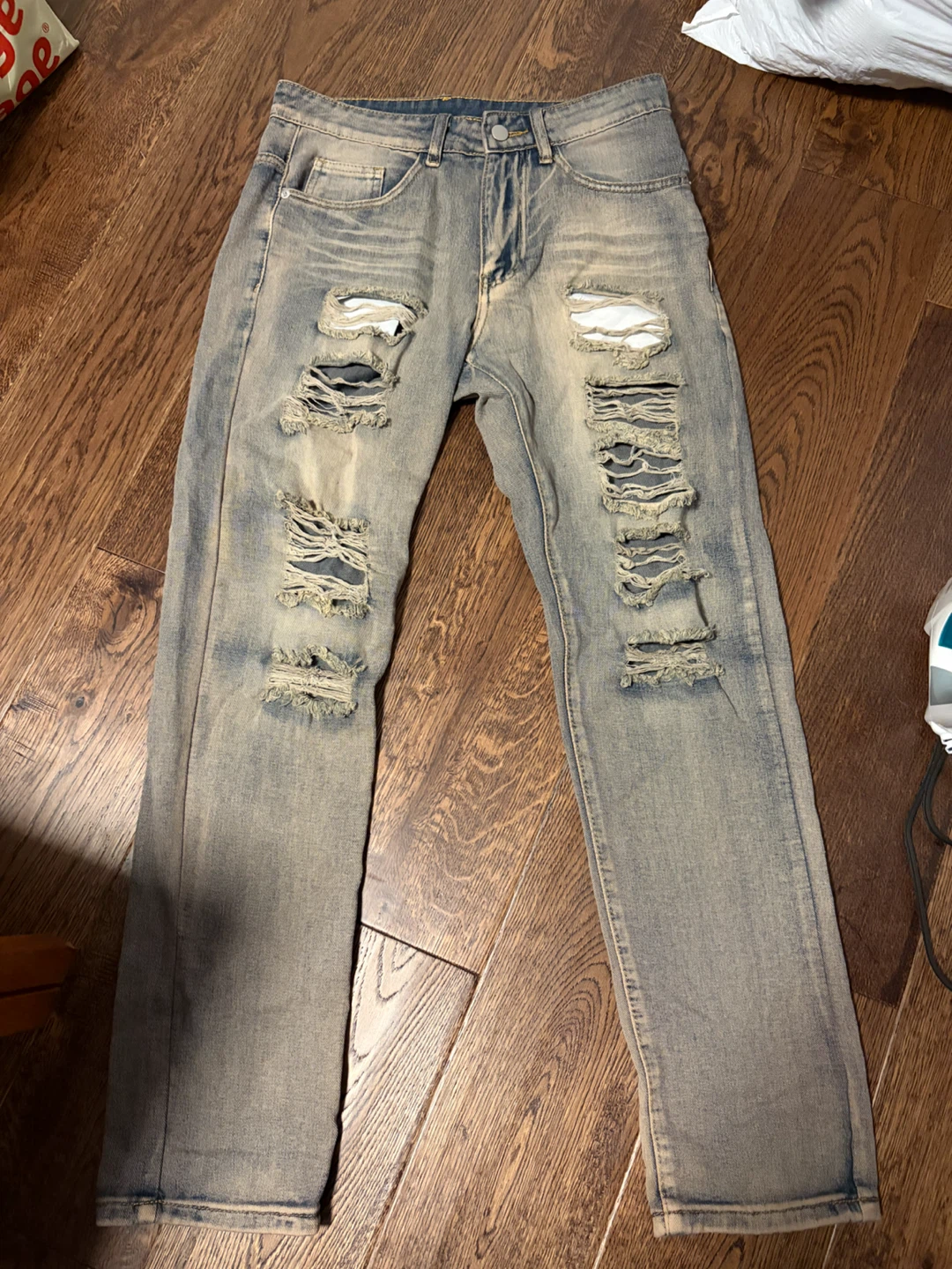 Distressed Light Wash Denim Jeans