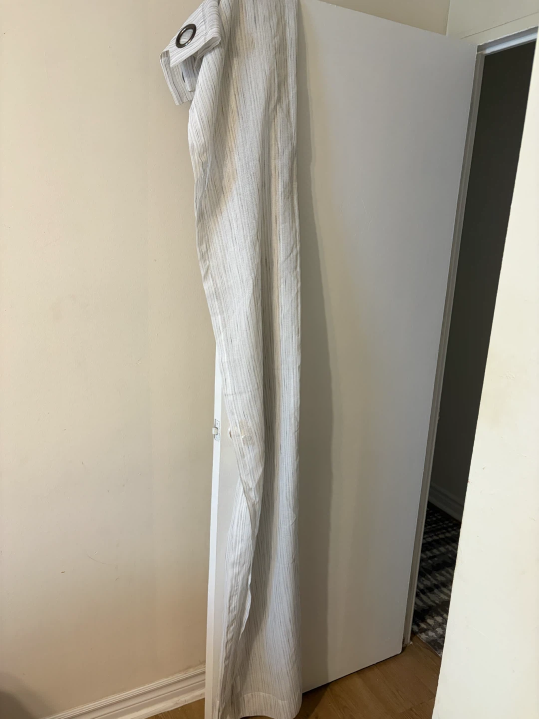 Set of grey striped and white embroidered curtains