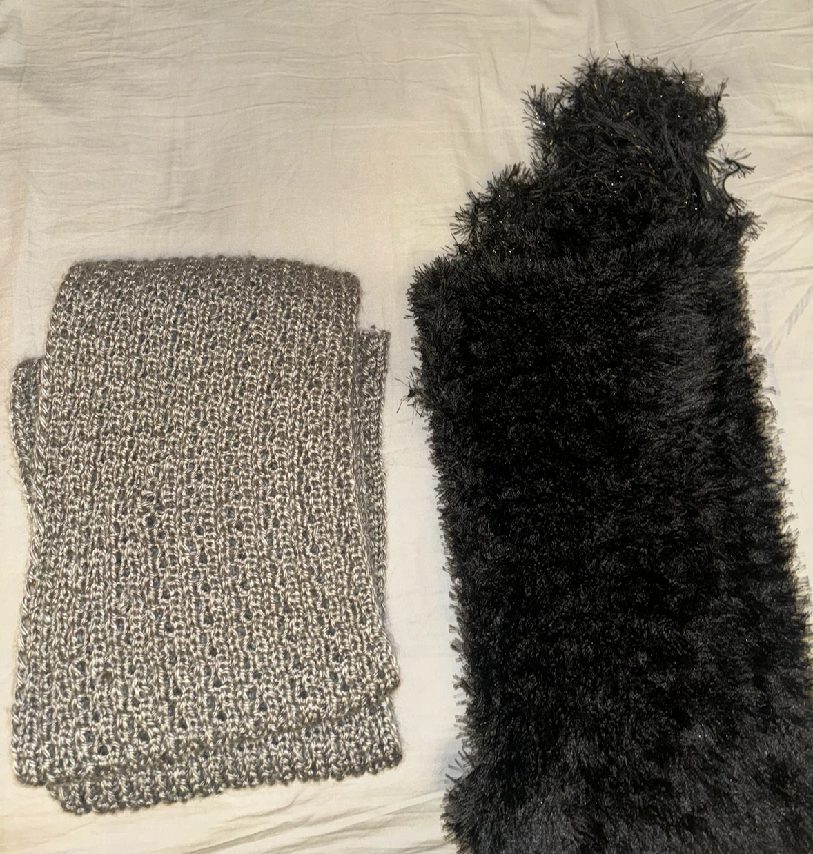 Two knit neck warmers grey and black