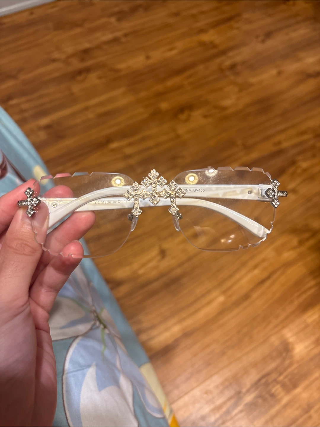 Rhinestone Cross Embellished Rimless Sunglasses
