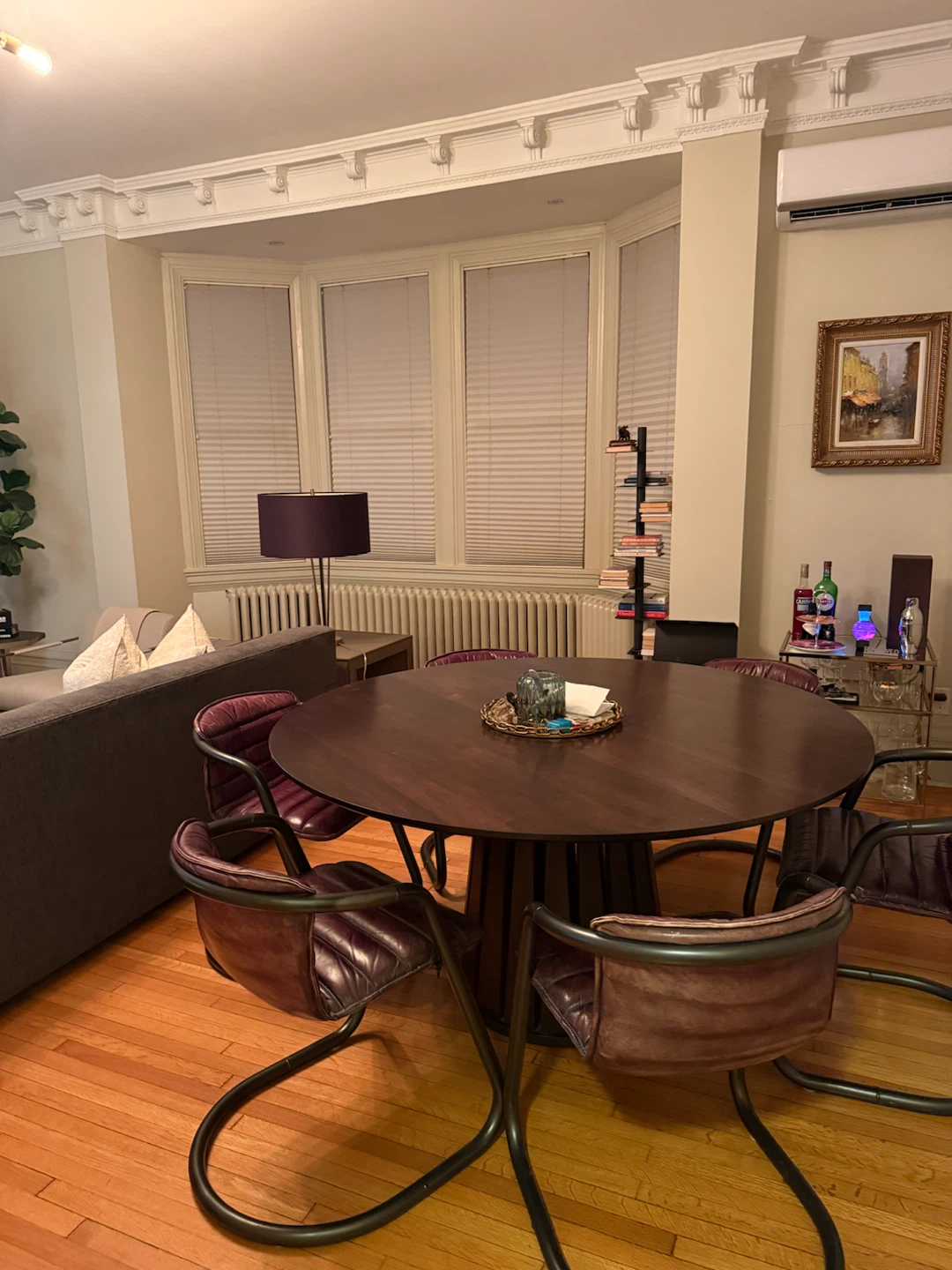 Round walnut Dining Table and 6 Leather Chairs