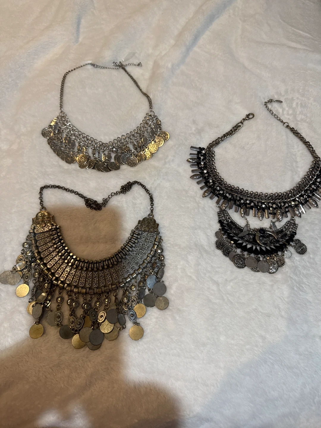Three statement necklaces