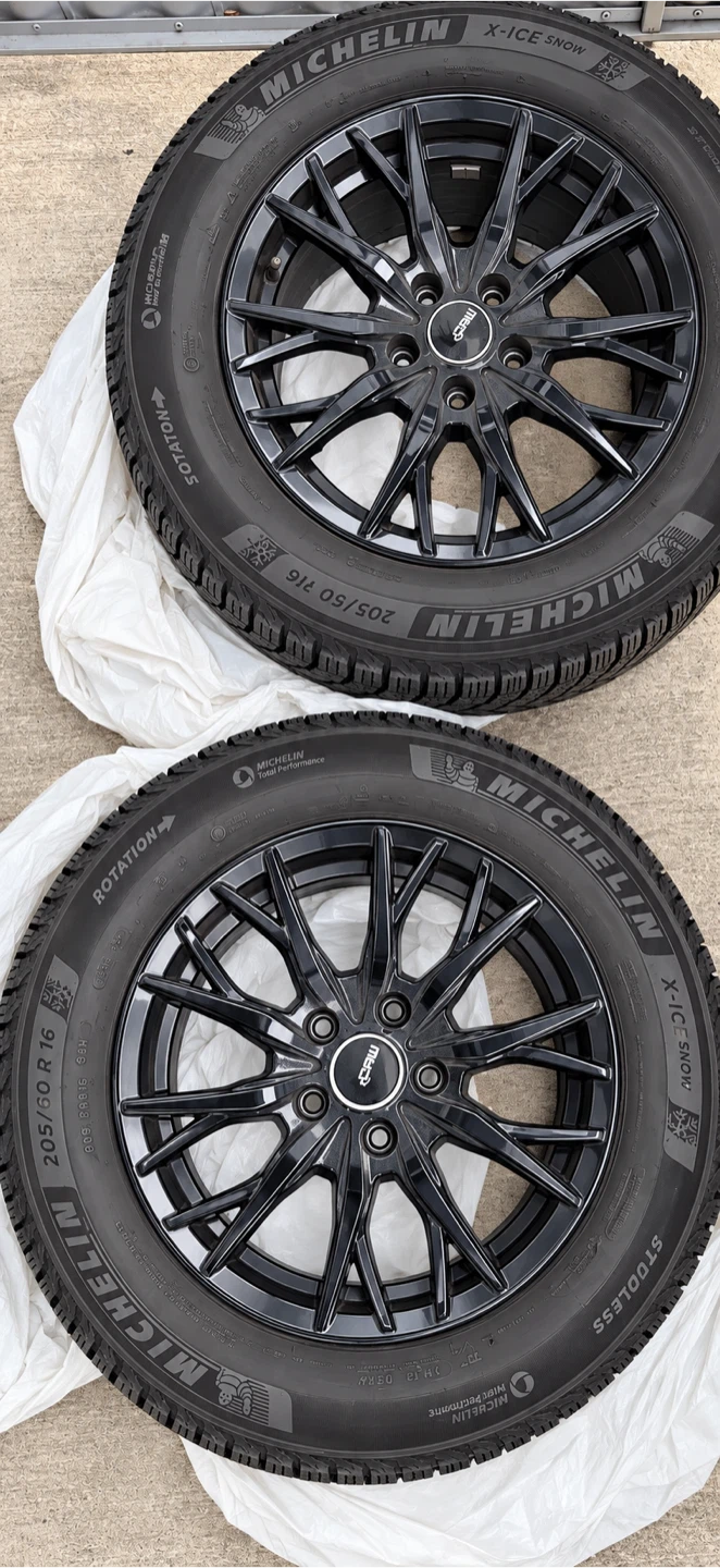 Michelin X-Ice Snow Winter Tires on Black Wheels