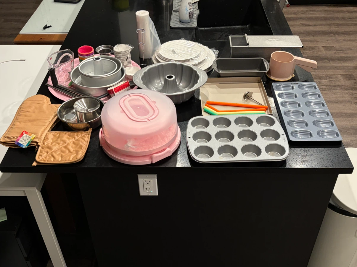 collection of baking pans and tools
