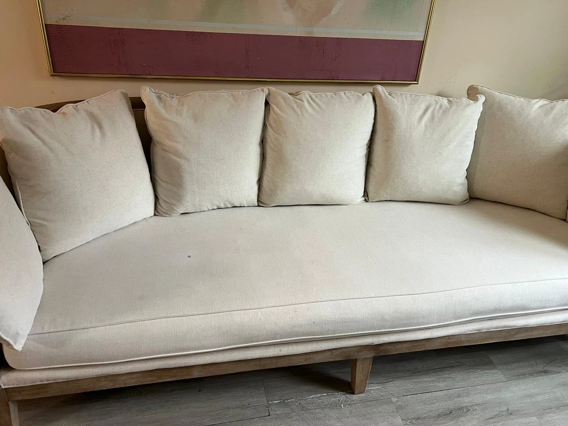 Curved Linen Sofa with Exposed Wood Frame