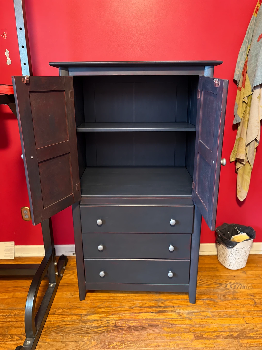 Dark purple wooden storage cabinet with drawers