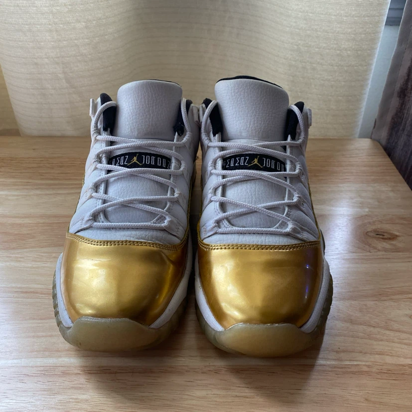Jordan 11 Retro Low Closing Ceremony Gold Sneakers