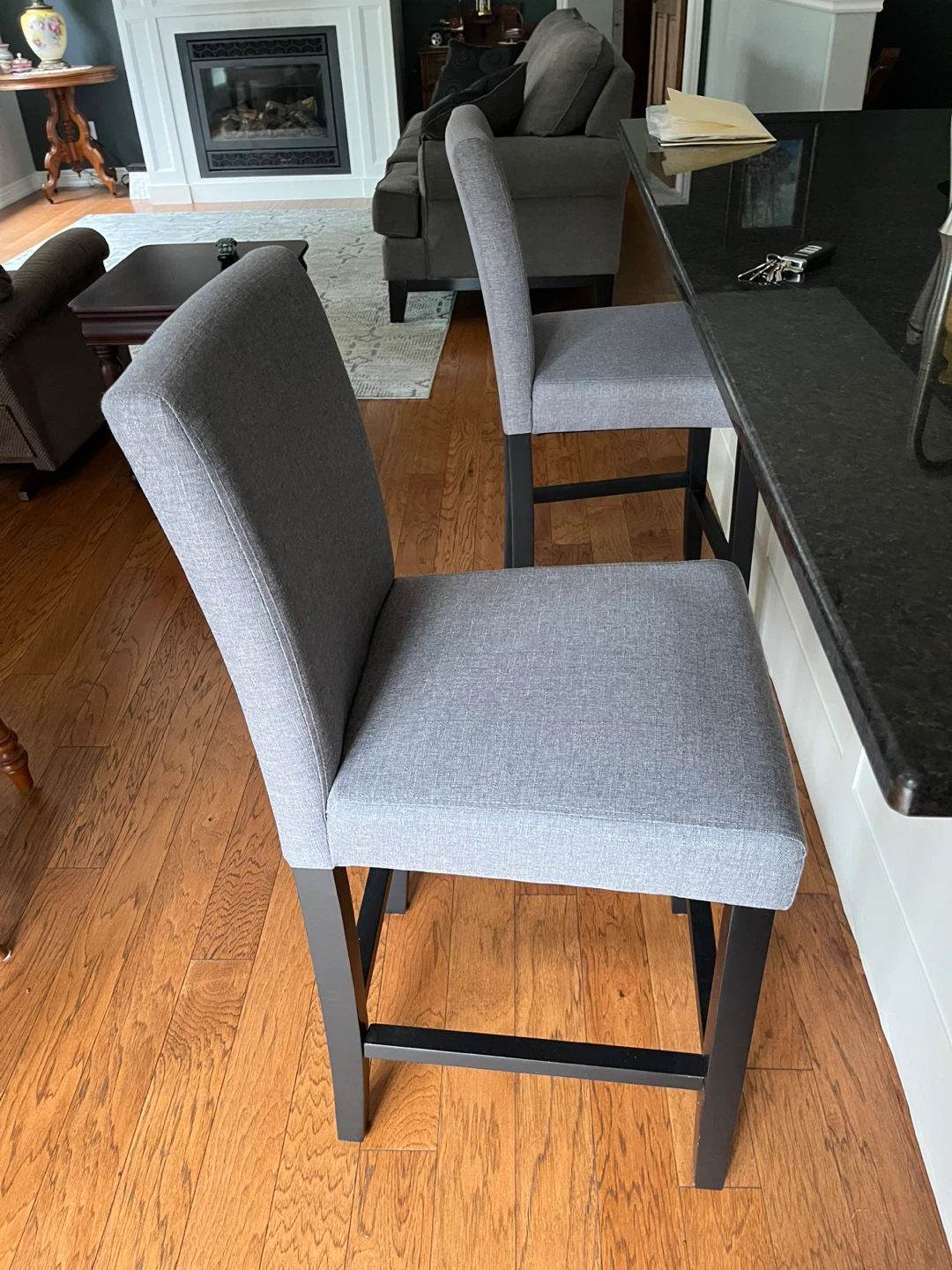 Set of two grey upholstered bar stools