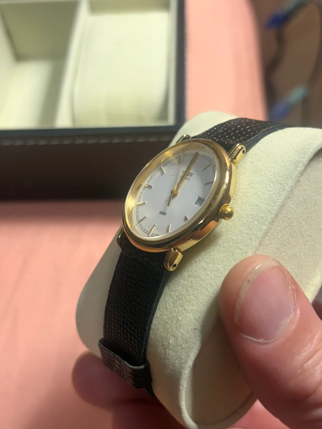 Classic gold-tone Timex watch with black leather strap - photo 2