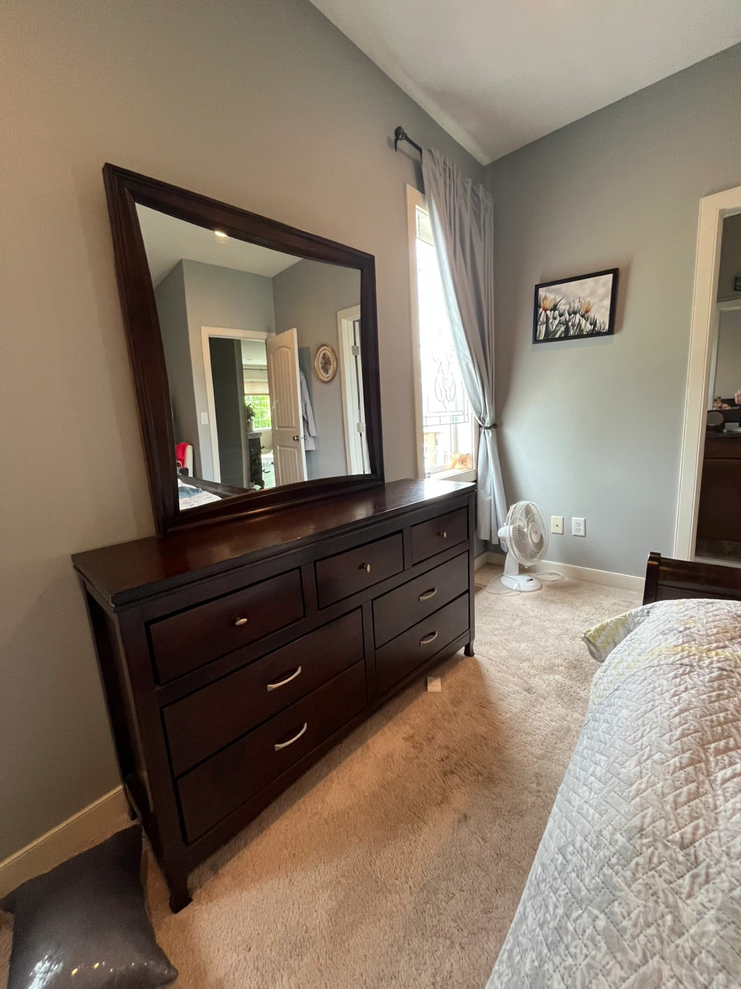 Dark wood dresser with matching mirror