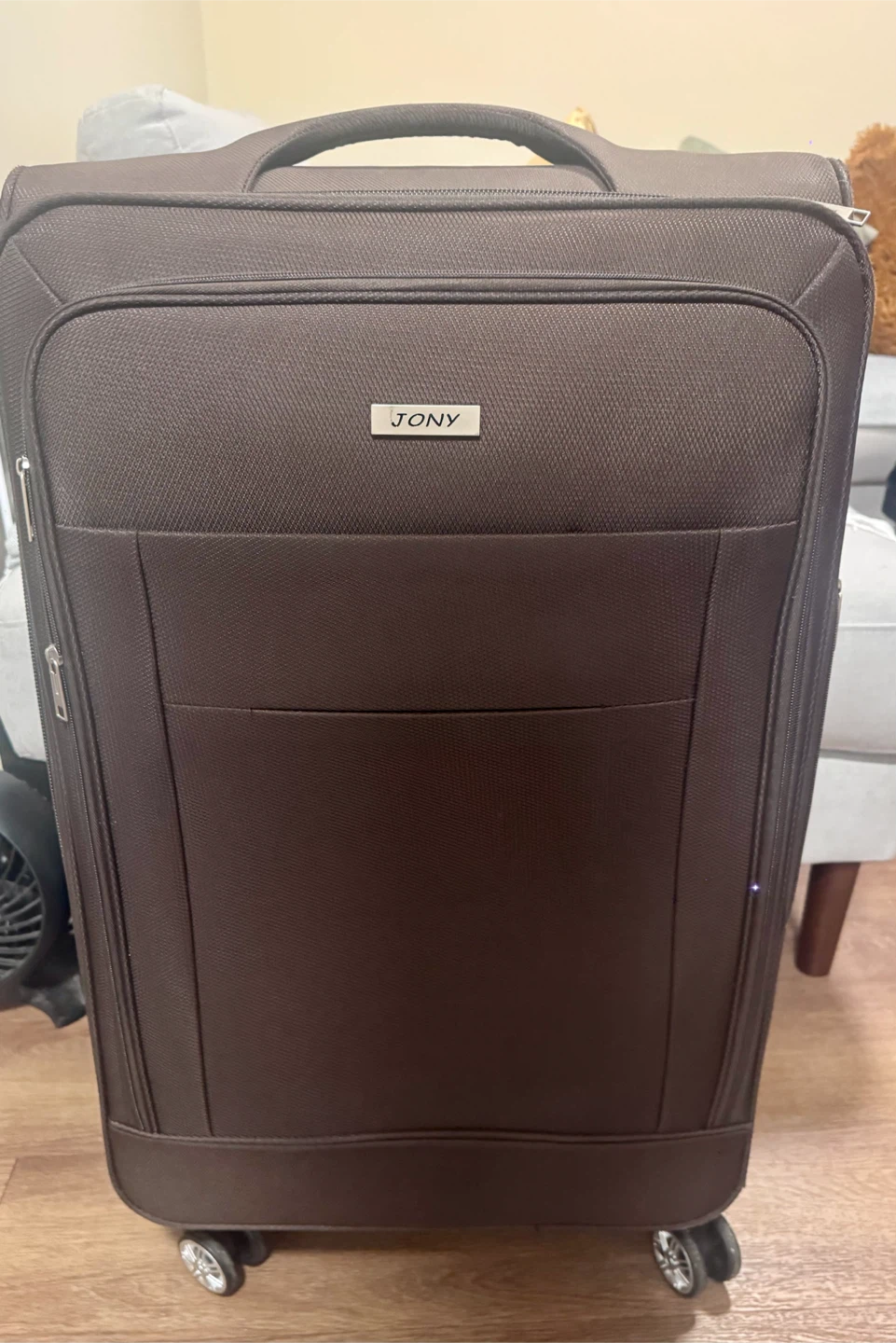 Jony brown rolling suitcase