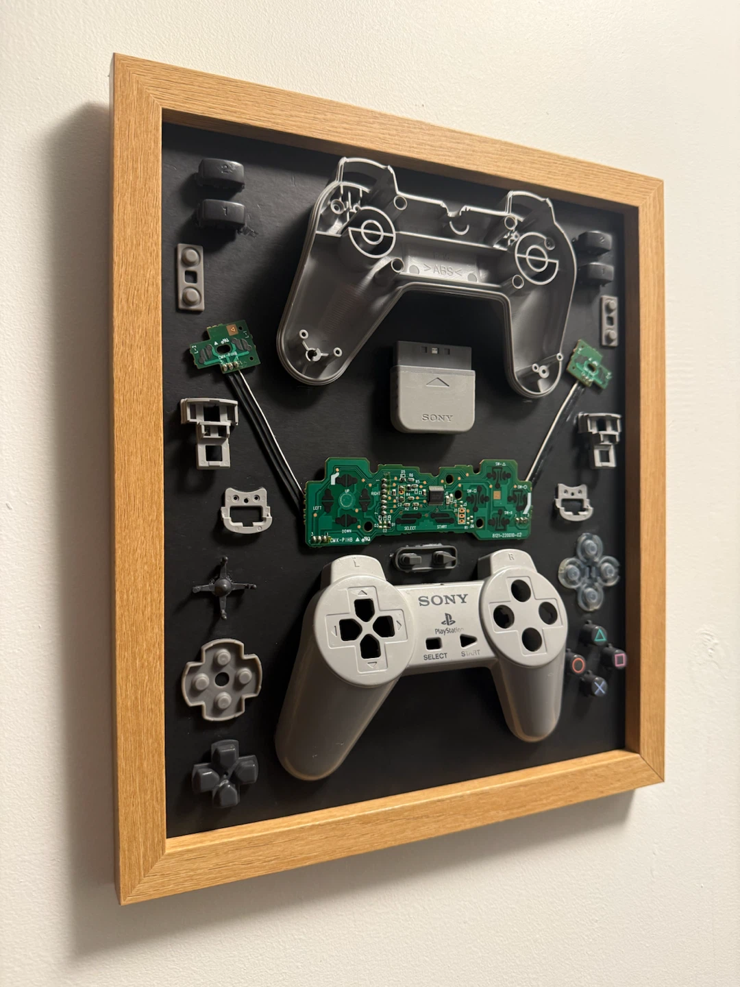 PlayStation controller shadow box art