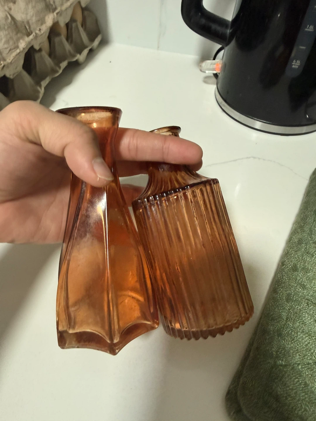 Set of two amber glass bud vases