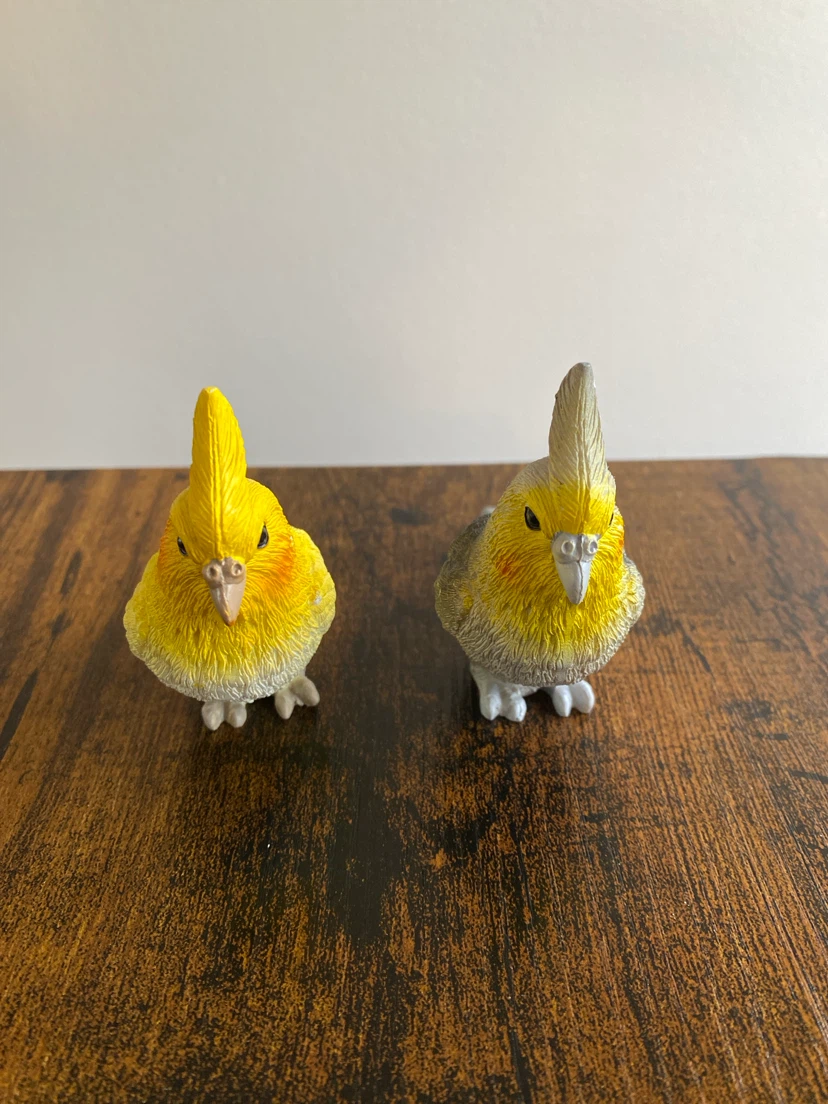 Set of two cockatiel bird figurines