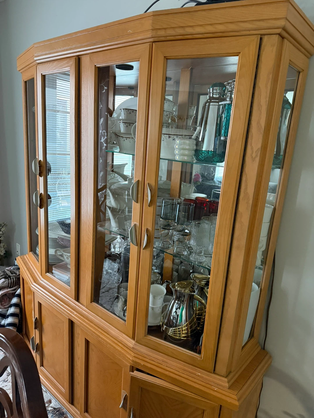 Oak china cabinet with glass doors