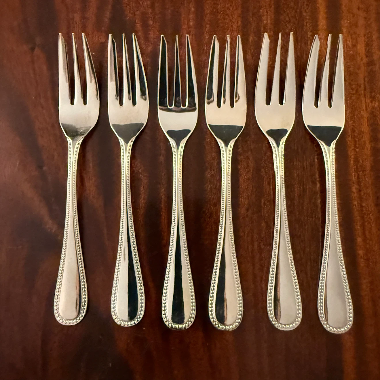 Set of 6 Ormont silverplated fruit forks